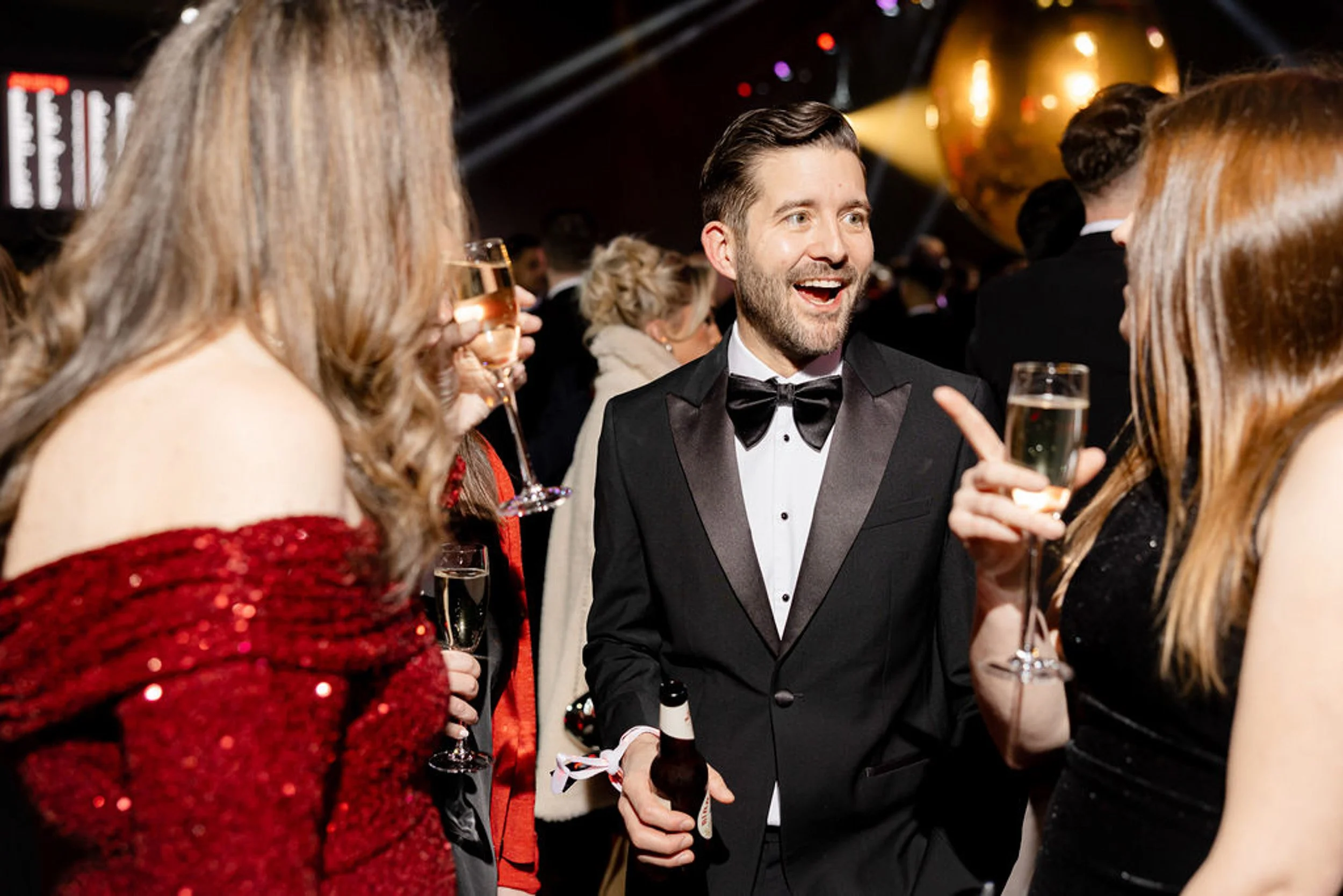 Guests chatting over drinks at the KFC awards reception.