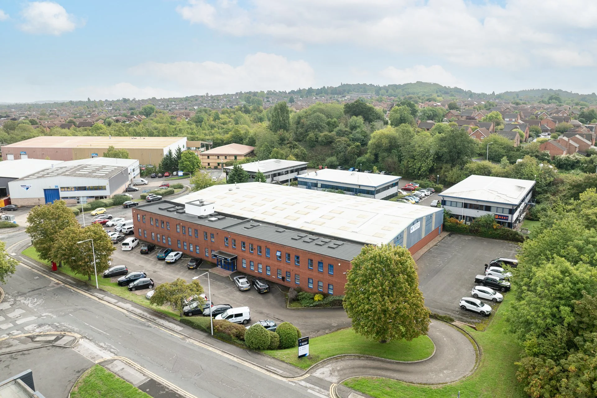 Aerial view of WLR Precision Engineering’s premises, car park and surrounding industrial estate.
