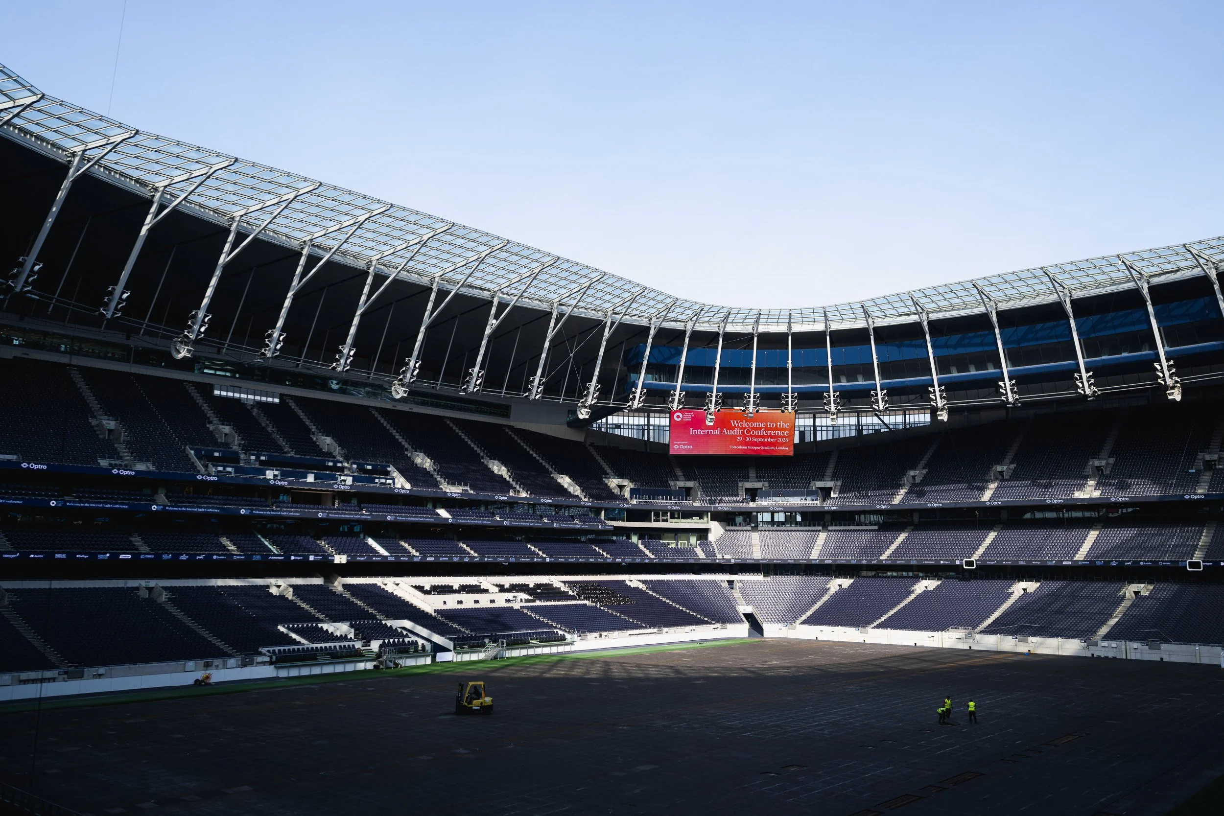 Wide view across the inside of Tottenham Hotspur Stadium.
