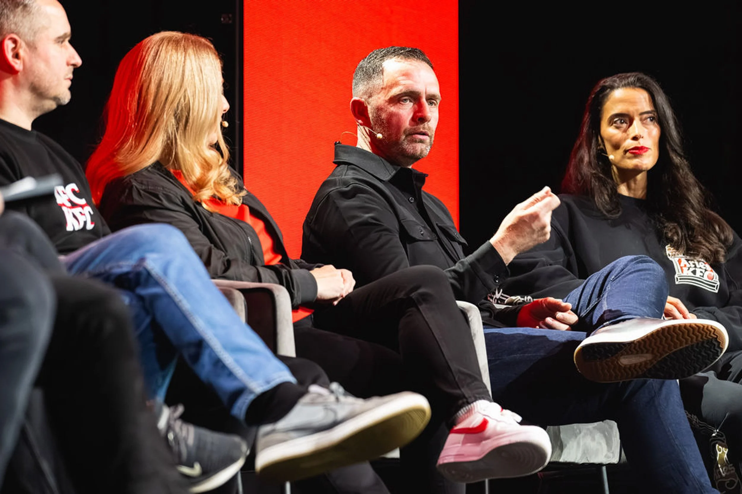 Panellists taking part in a seated discussion during the KFC conference.