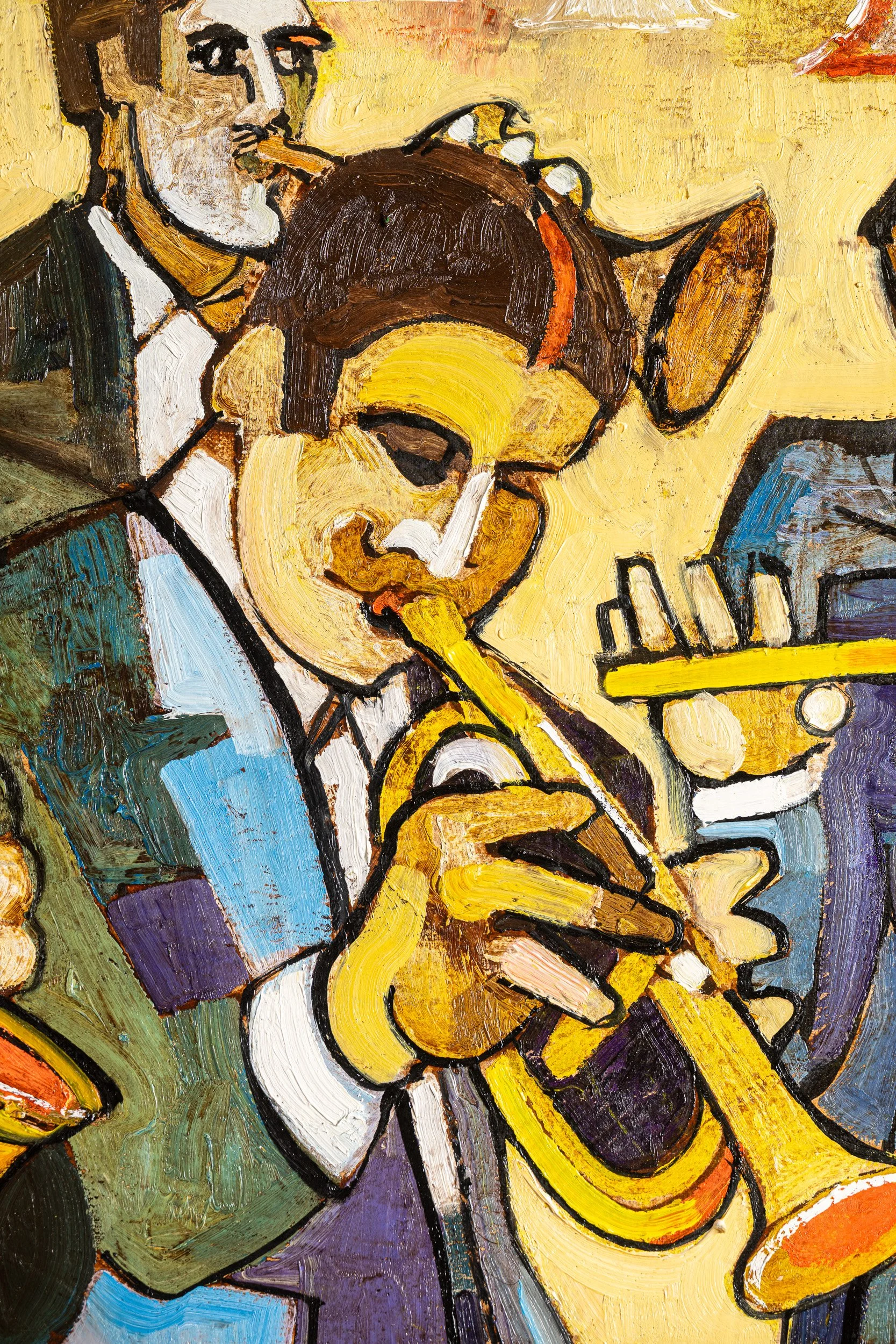 Close-up of a painted trumpet player in yellow, blue and black.