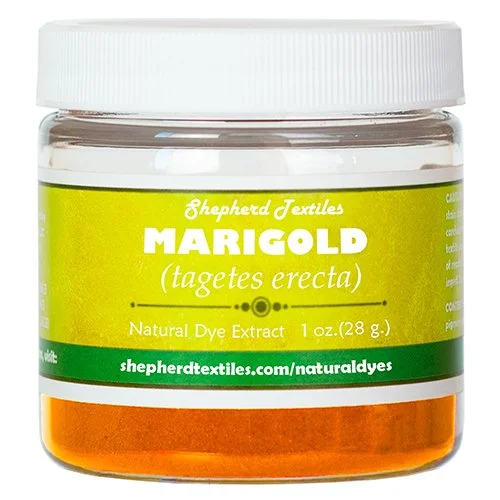 A plastic jar full of orange powder labeled "Marigold".