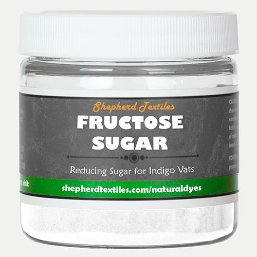 A plastic jar filled with white powder labeled "Fructose Sugar."