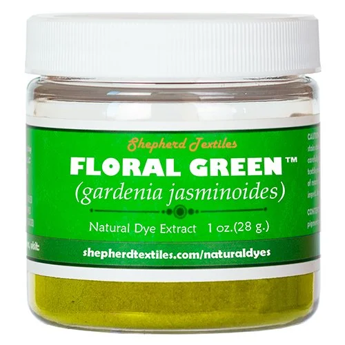 A plastic jar full of green powder labeled "Floral Green".