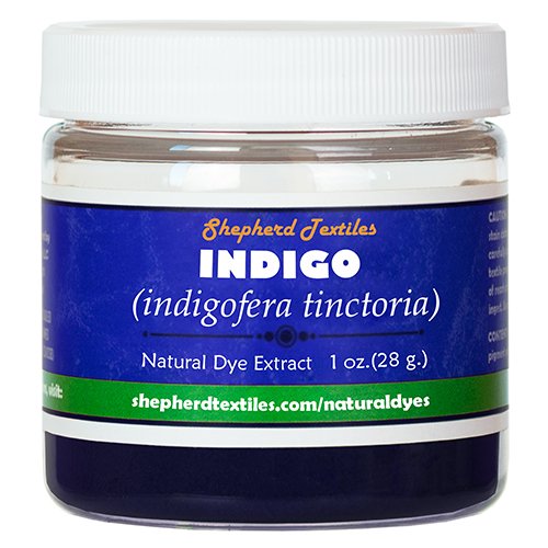 A plastic jar full of blue powder labeled "Indigo".