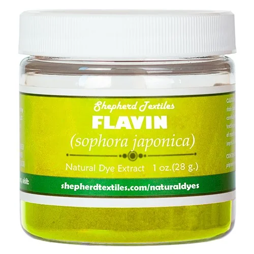 A plastic jar full of yellow powder labeled "Flavin".