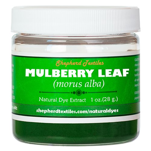 A plastic jar full of green powder labeled "Mulberry Leaf".