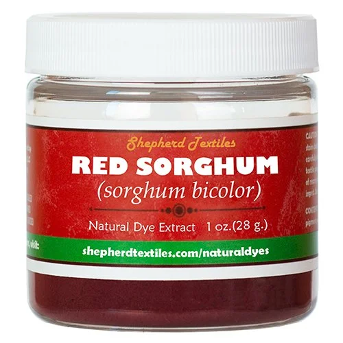 A plastic jar full of red powder labeled "Red Sorghum".