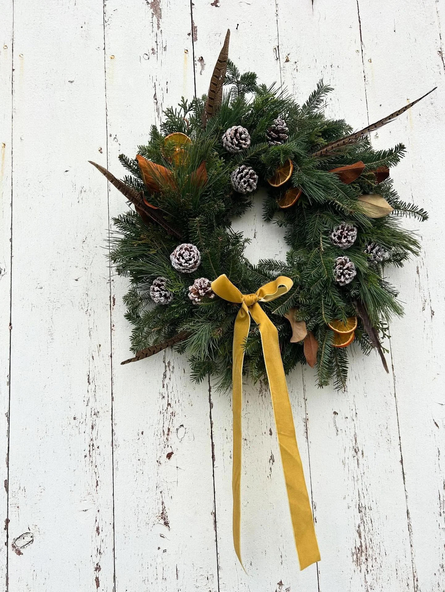 Trying to stop myself from adding feathers to every single wreath because I love them just a little too much.

We&rsquo;re working on decorating lots of beauties for the OLC Holiday Bazaar this Saturday! Catch us there with porch pots, wreaths, and s