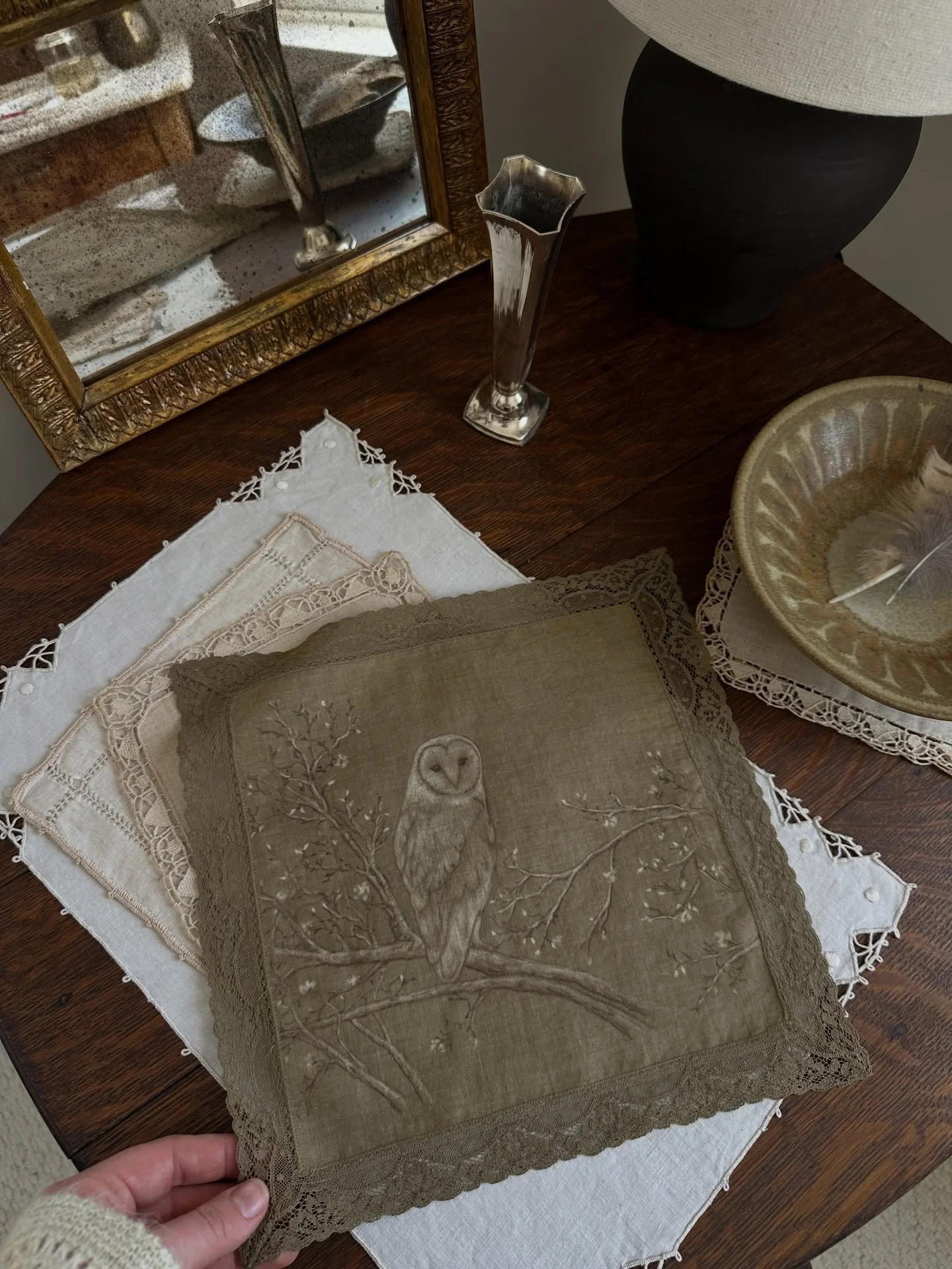 Many of the pieces in this collection, especially those on the olive linen, are meant to reward close looking.

This work brings me back to the beginning of it all. For a long time, my experience of the owl was only sound. I would hear her hooting so