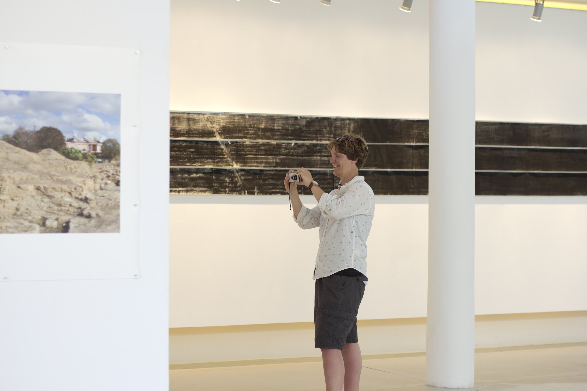  Installation photograph of the group exhibition  Travellers from Australia,  Pailia Ilektriki, Ktima Pafos, Cyprus, 2-15 October 2017. Works by artist  Guy Hazell  (left) and  Lawrence Wallen  (right) visible in the gallery. Photo: Shelley Webster. 