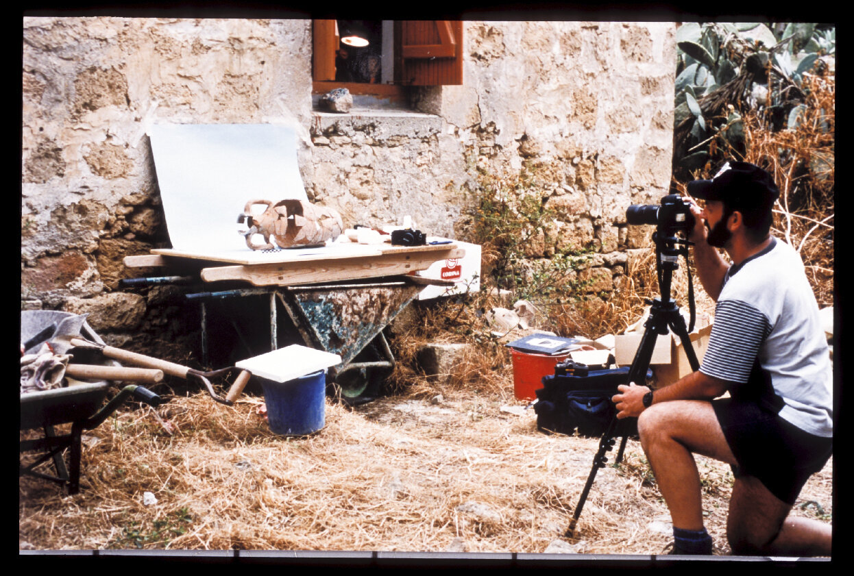  Photographer  Bob Miller   making work on the Paphos Theatre Archaeological Project site in the early days of the project. Miller’s work investigates the contemporary relationship between artefact, site and image. Photo courtesy of Bob Miller. 