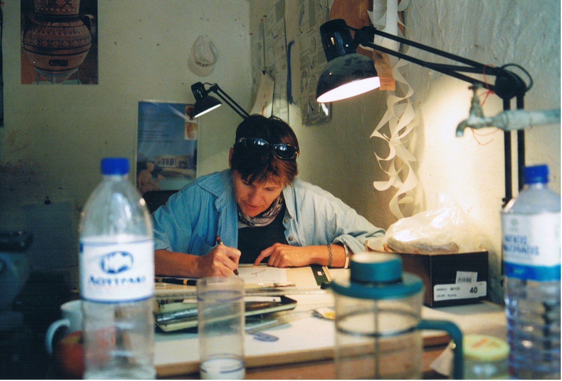  Video artist and filmmaker  Amanda Dusting  making archaeological illustrations in the drawing room, 2006. Dusting has also worked as an archaeological illustrator for the project for many years. Photo: Courtesy of Amanda Dusting. 