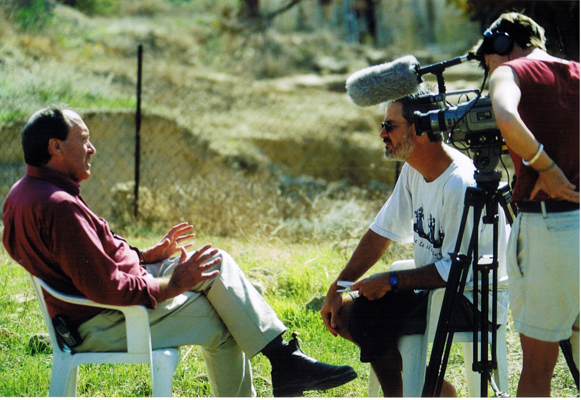  Film maker and video artist  Amanda Dusting  and Director Producer Darrell Rigby working to interview Emeritus Director J. Richard Green on-site for the short film  The Dig : Unearthing the Ancient Paphos Theatre  (2005),   directed and produced by 