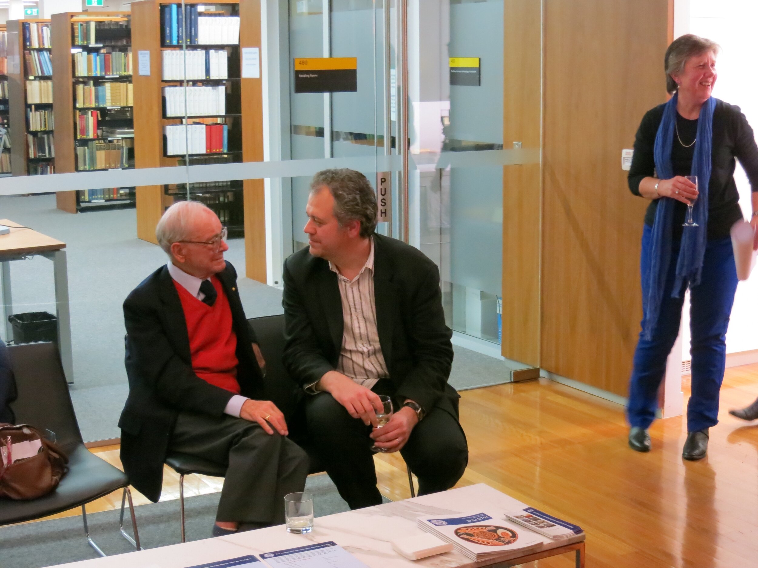  From left: the late Prof. Alexander Cambitoglou speaking with Dr. Craig Barker at the opening of  Response to Cyprus,  10 July 2013. The event was hosted by the Australian Archaeological Institute at Athens (AAIA) at the Centre of Classical and Near