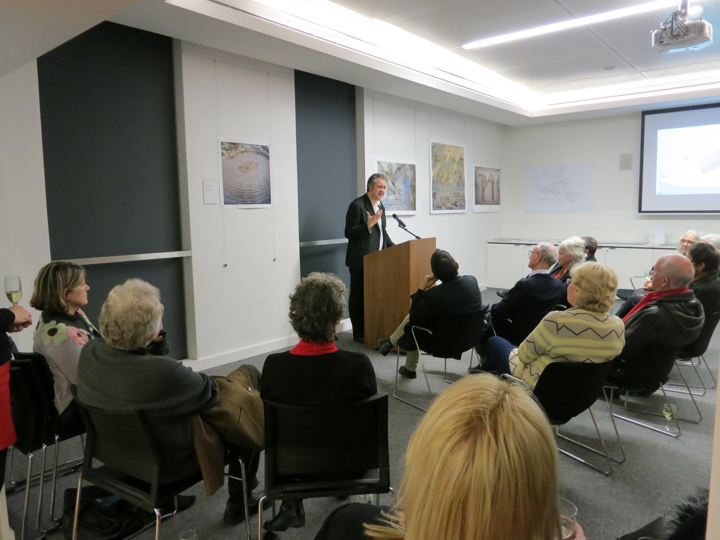  Dr. Craig Barker speaking at the opening of  Response to Cyprus,  10 July 2013, hosted by the Australian Archaeological Institute at Athens (AAIA) at the Centre of Classical and Near Eastern Studies of Australia (CCANESA). Works by Derek Kreckler ar