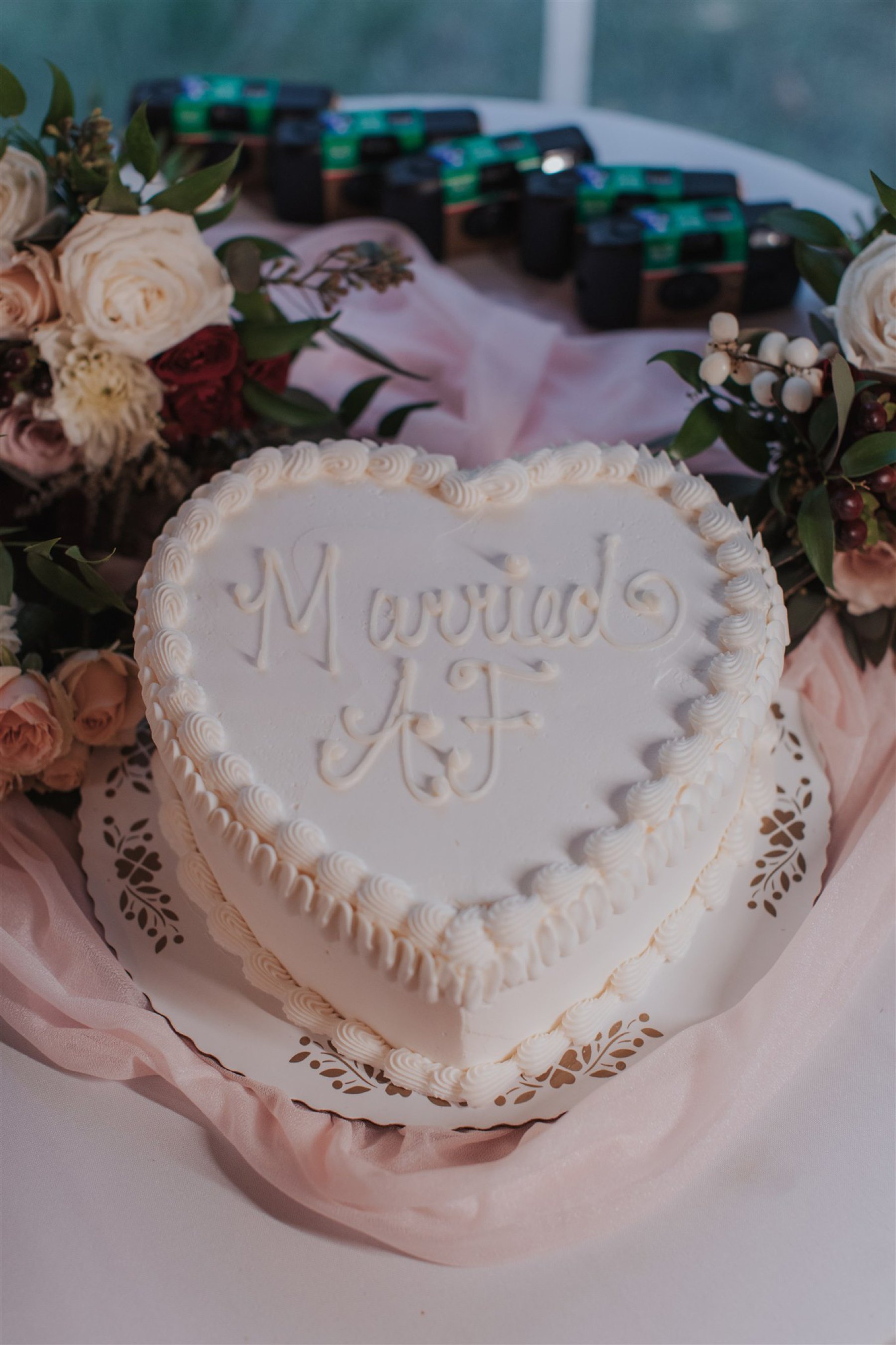 Married AF heart-shaped wedding cake