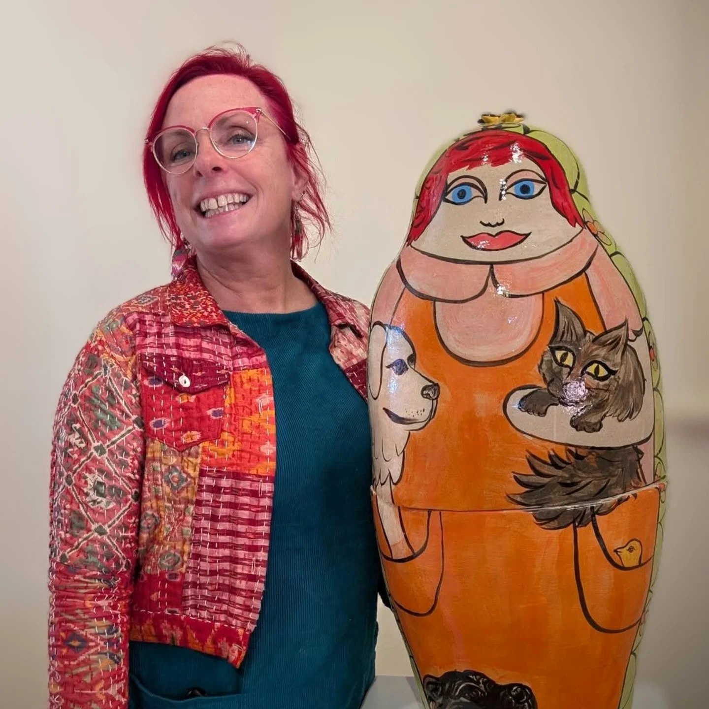 BurmanFelicity_ArtistPicturewithLargeCeramicBabushkaDoll.webp