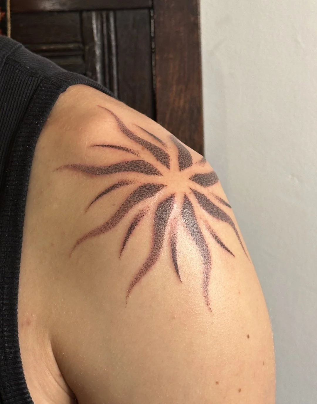 sun-tattoo-shoulder.jpeg
