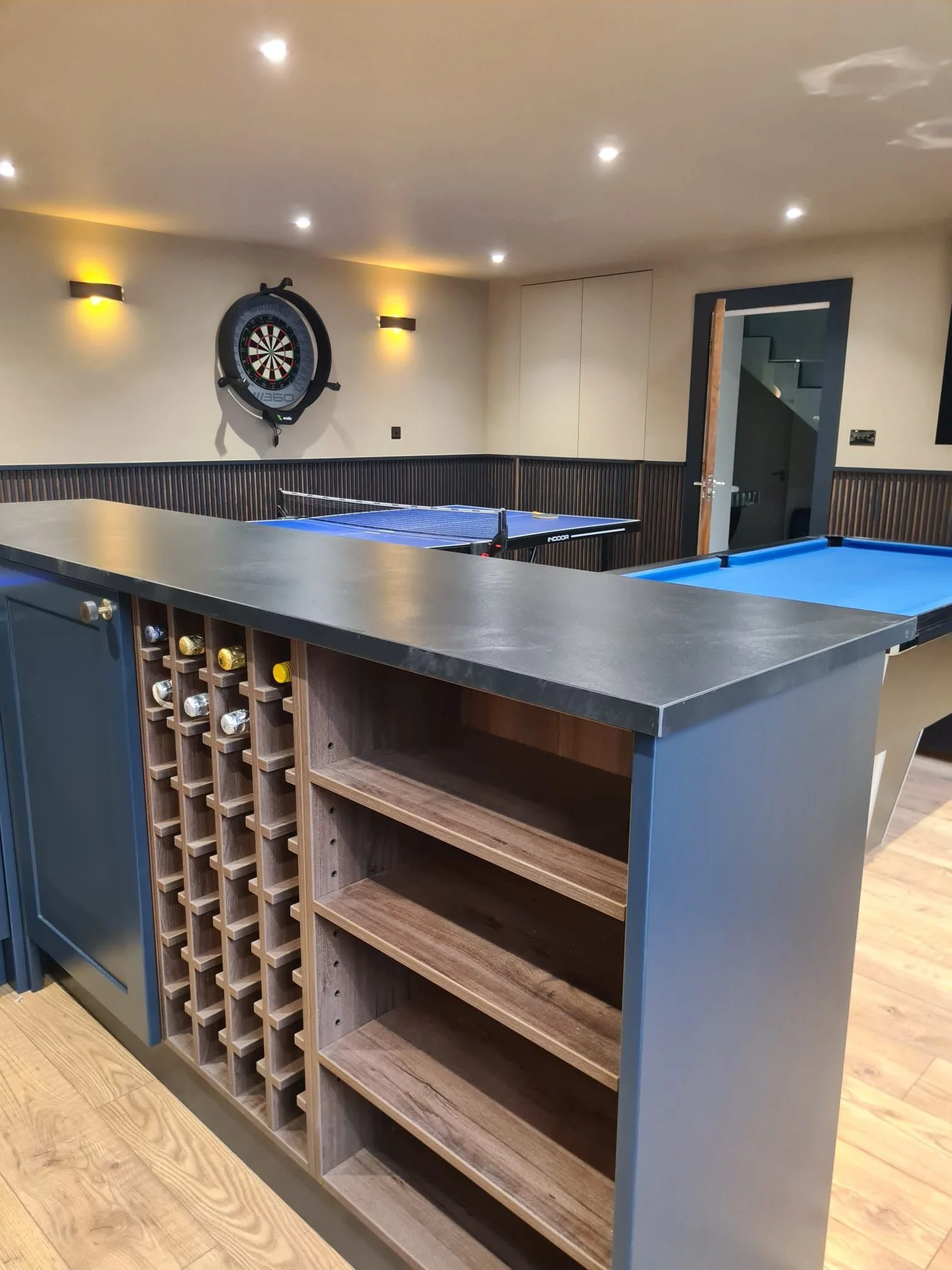 More storage, wine racking and shelving for glassware.