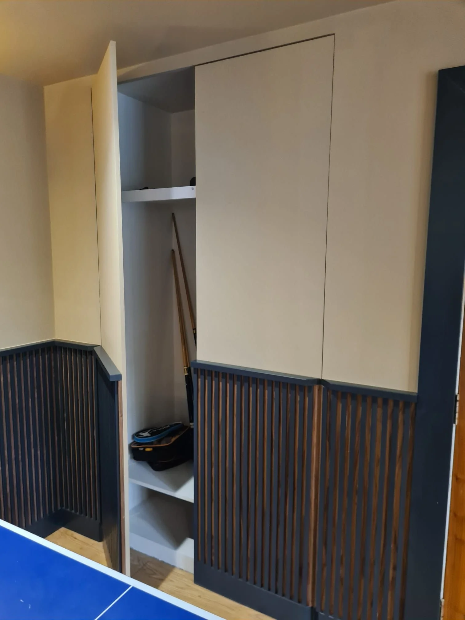 Integrated cupboard storage hidden into the scheme.