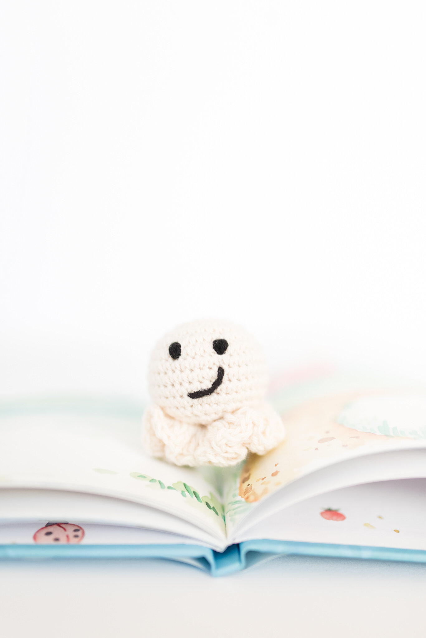 Popcorn Pearl sitting on top of Popcorn Thanks book