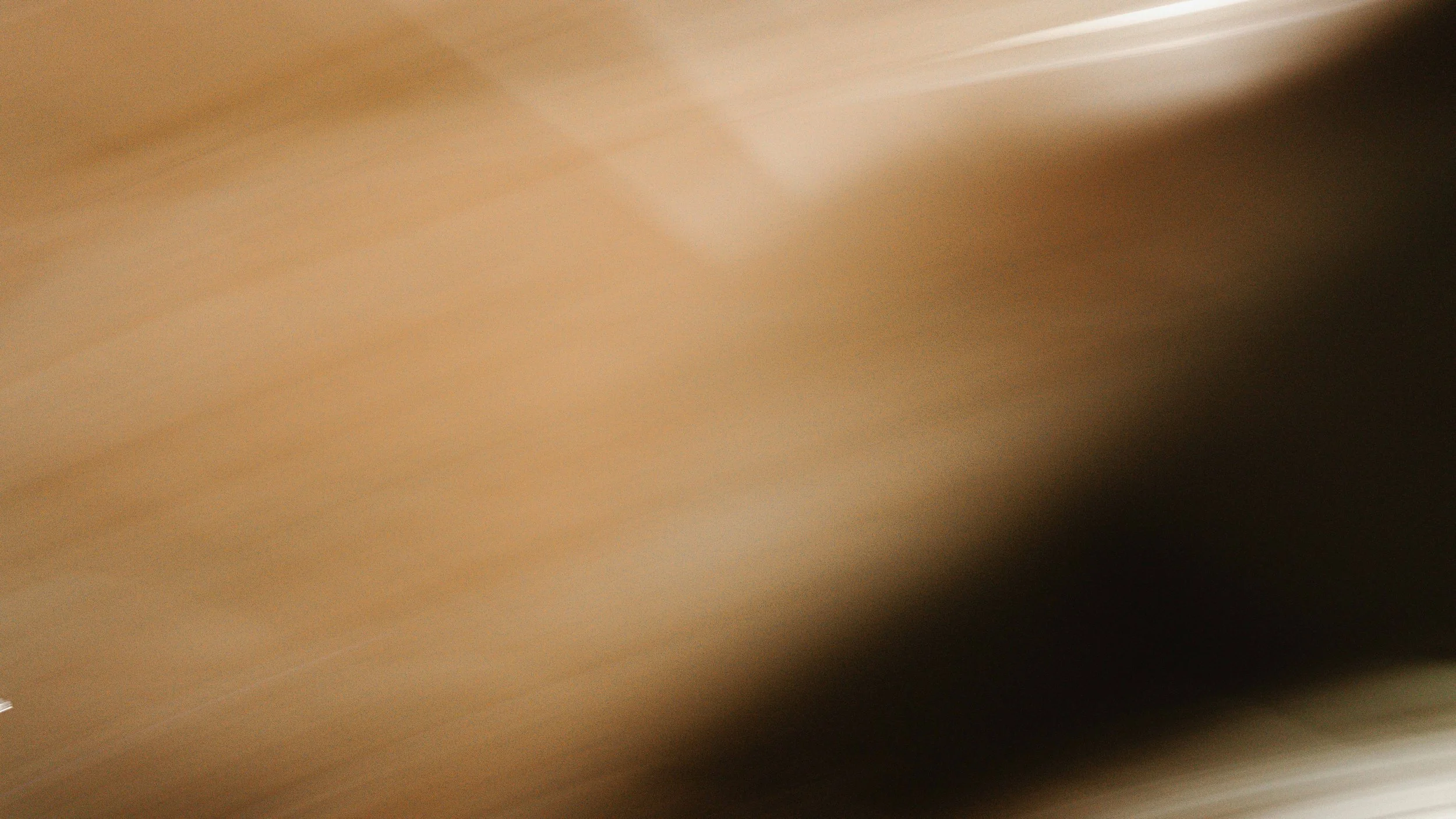 The image is blurry with no distinguishable objects or features.