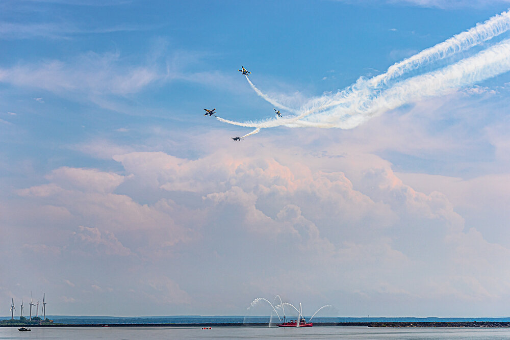 US Navy Blue Angels flying over Edward M. Cotter Fireboat