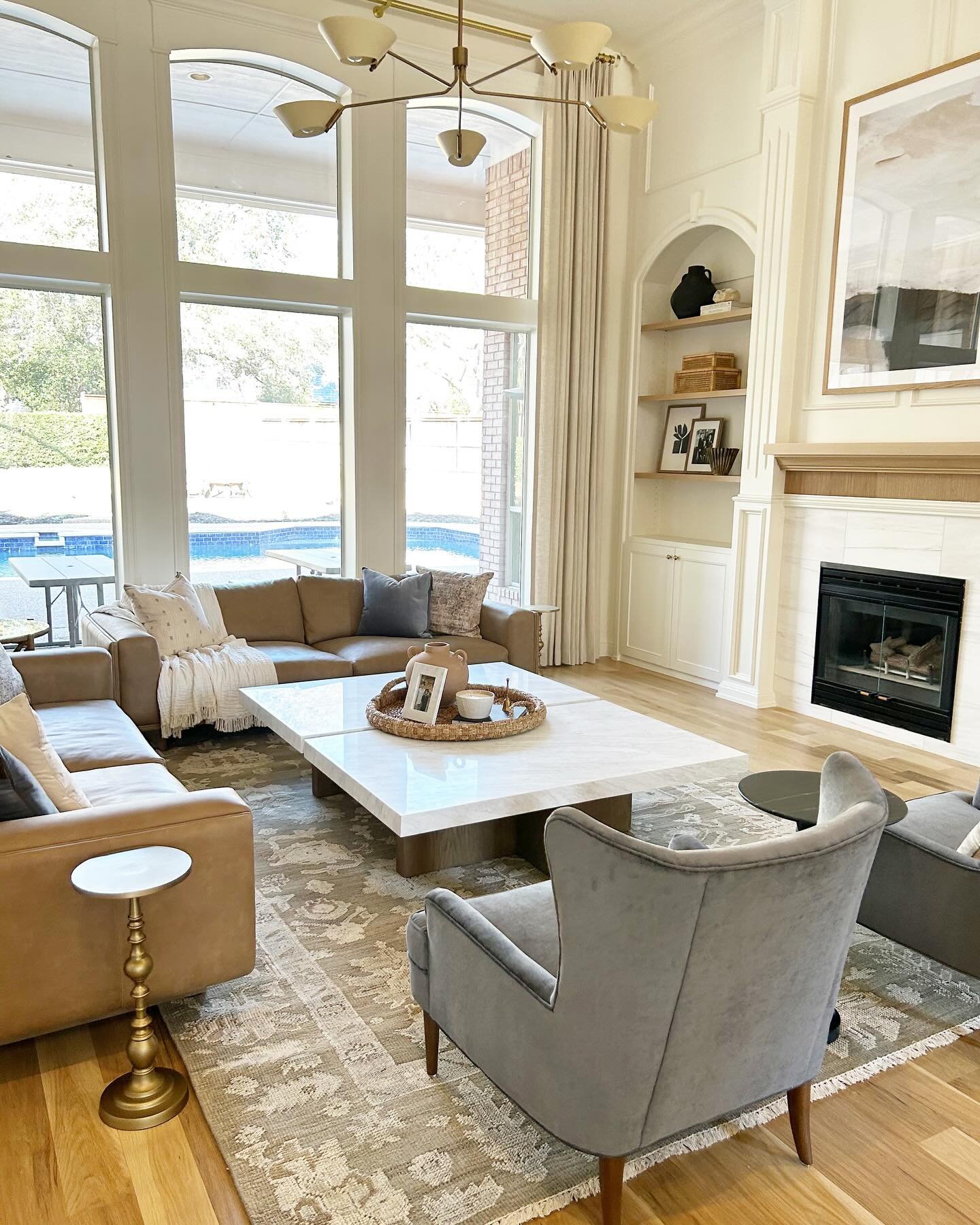It&rsquo;s finally rug install day at #projectcolleyvillewest!! Swipe to see the difference that a gorgeous hand knotted rug can make when designing a room. This rug brought pattern, warmth and texture to the space. It was 100% worth the wait. 😍