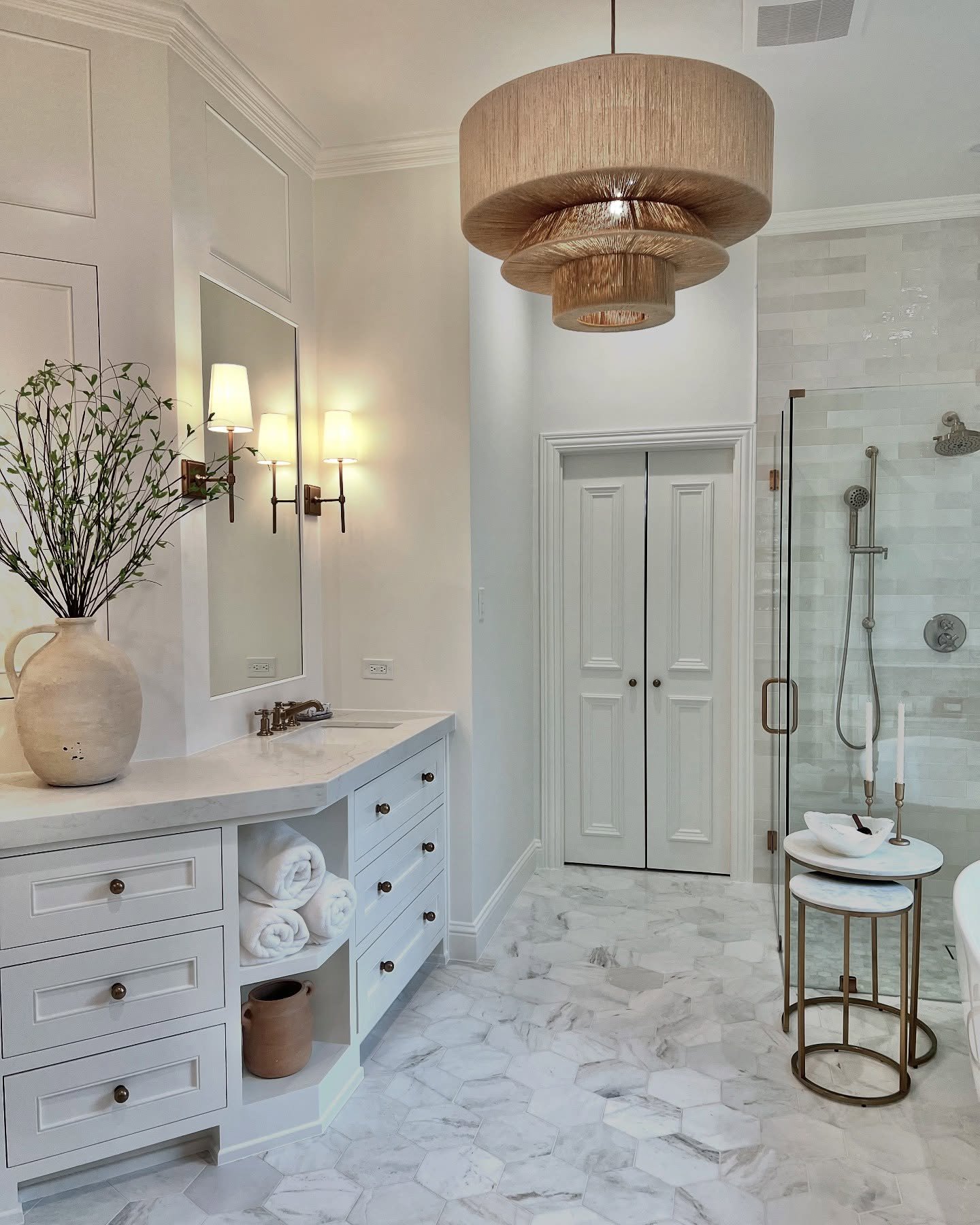 We reimagined this master bathroom as a calm, refined space with timeless appeal! Soft neutrals, marble finishes, warm brass accents, and custom cabinetry come together to create a look that feels elevated but easy to live in.

It&rsquo;s a space des