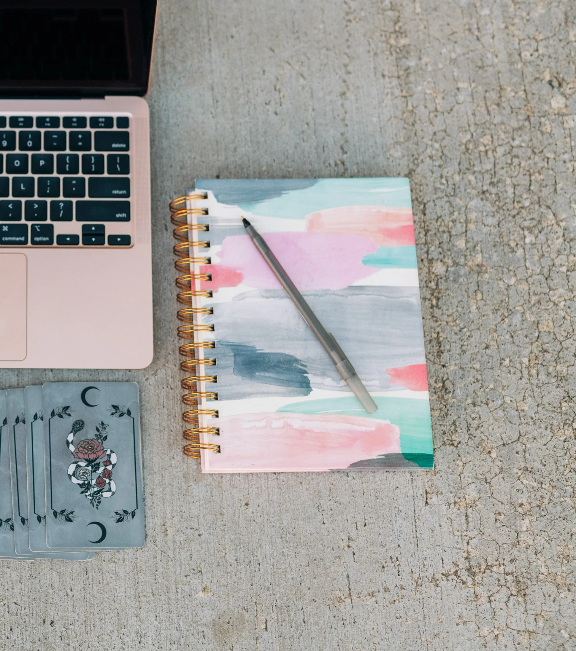 macbook, oracle card deck, journal flat lay for a small business 1-1 strategy session