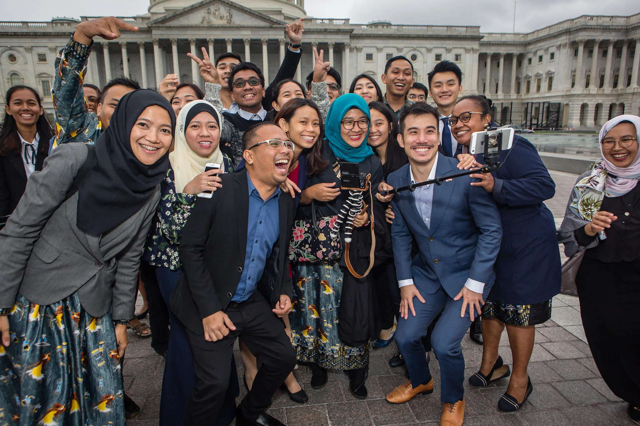 group of participants taking selfie in front of US capitol.jpg