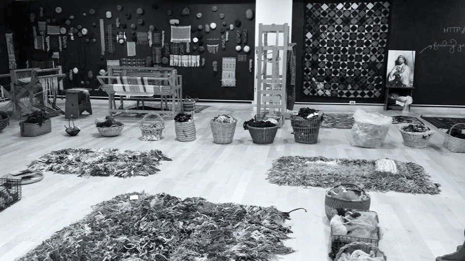 As the first artist selected by the City of Chicago for a social practice residency, I spent four months transforming the Garland Gallery into a community textile studio. Donated materials, looms, books, and unfinished examples created an environment