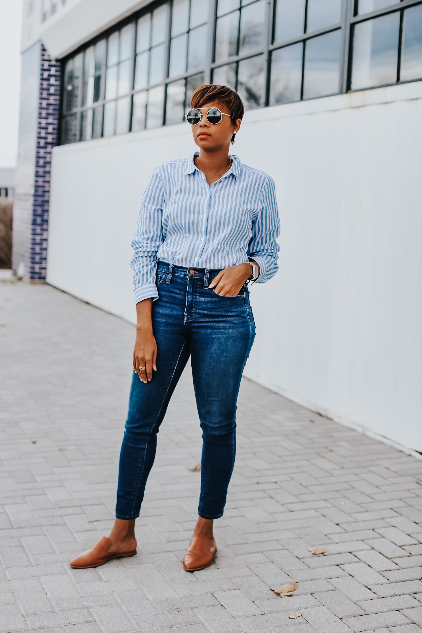 Mary's Little Way in A Blue and White Striped Boyfriend Shirt, Blue Jeans, and Tan Mules
