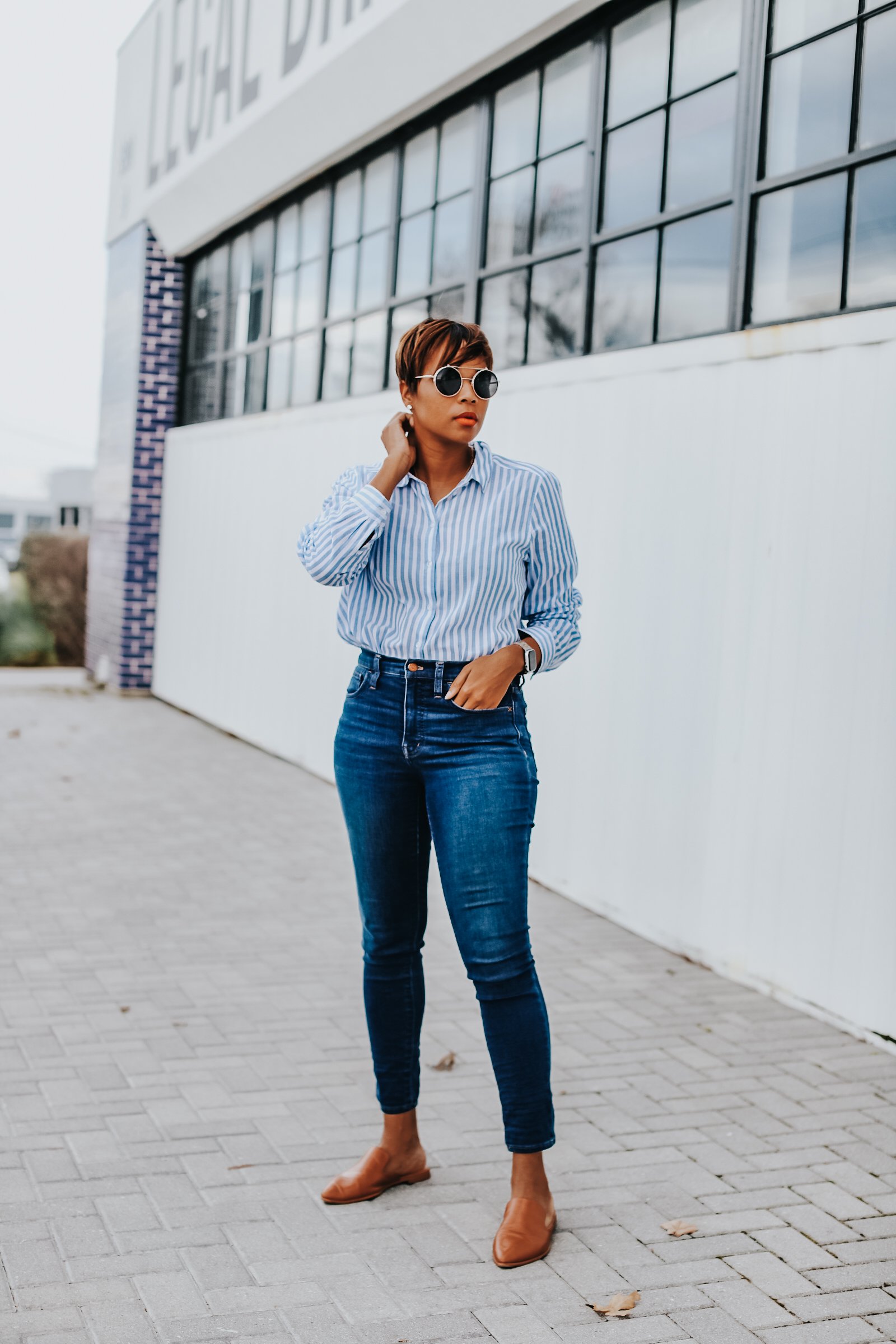 Mary's Little Way in A Blue and White Striped Boyfriend Shirt, Blue Jeans, and Tan Mules