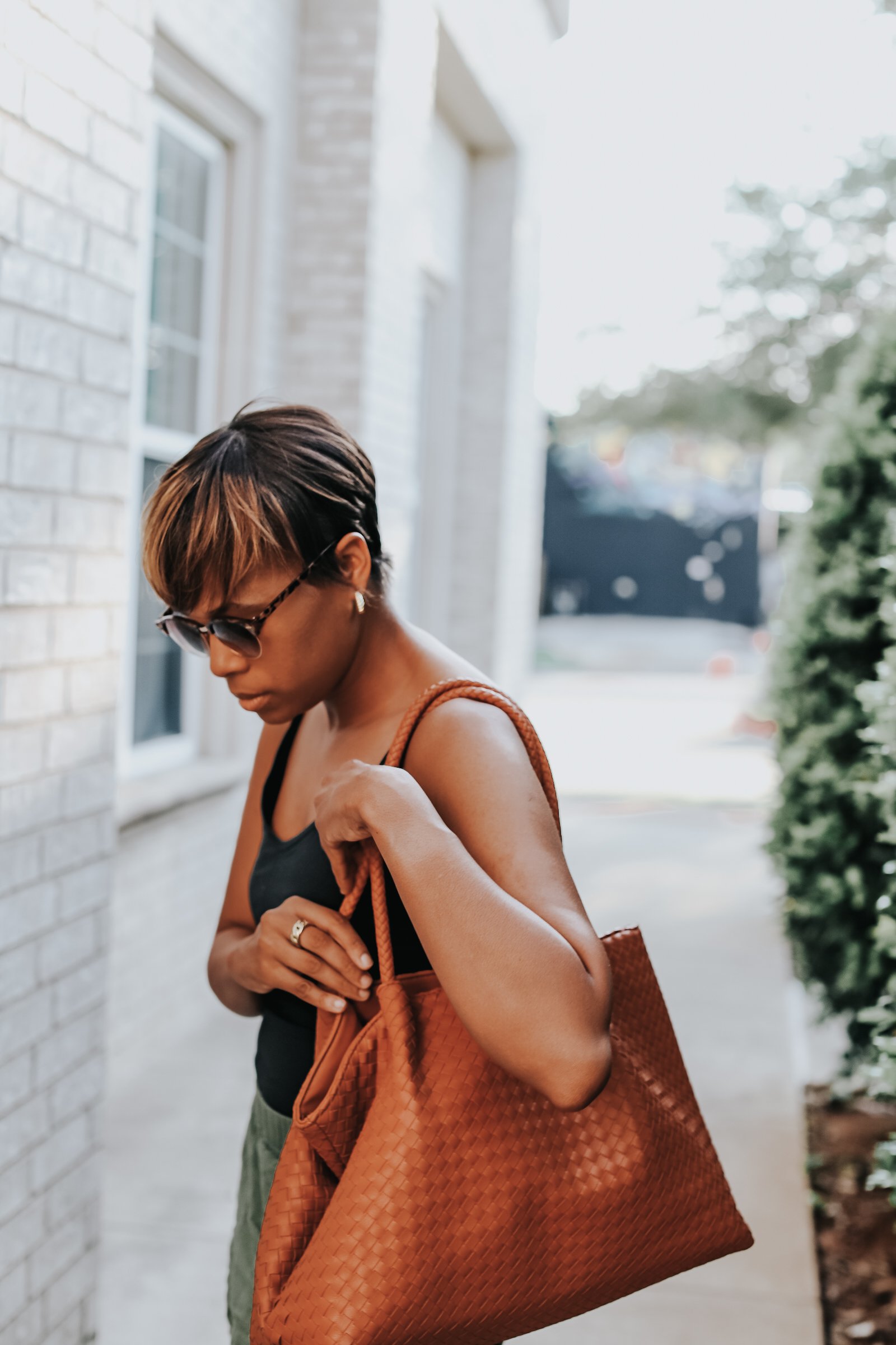 Mary's Little Way wearing Everlane's Cami Bodysuit, Everlane's Easy Shorts, Target's Birkenstock Dupes, and Able Clothing Selam Tote