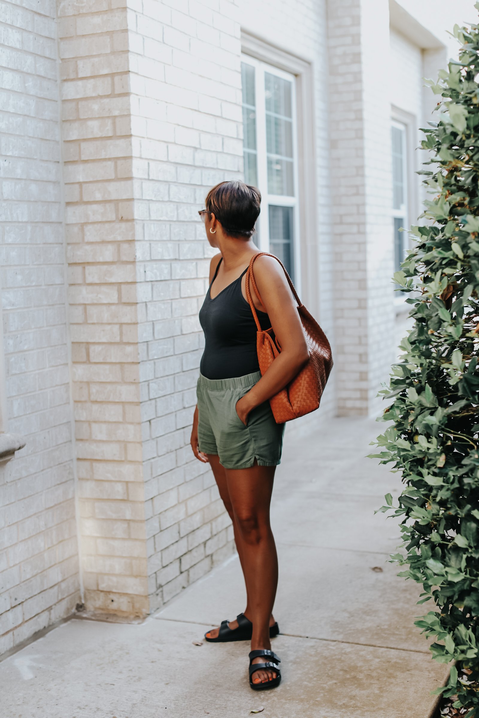 Mary's Little Way wearing Everlane's Cami Bodysuit, Everlane's Easy Shorts, Target's Birkenstock Dupes, and Able Clothing Selam Tote