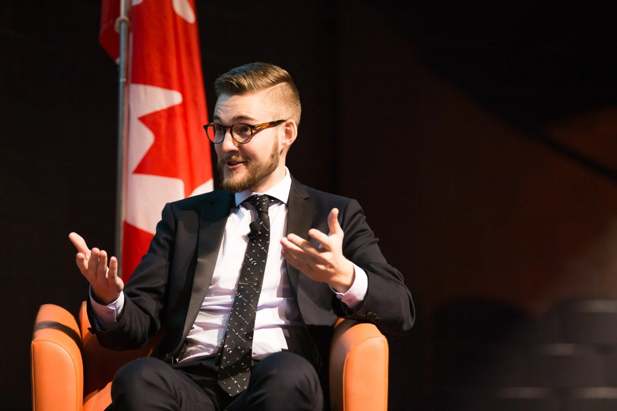 Nicholas Belliveau interviewing the US Consul General