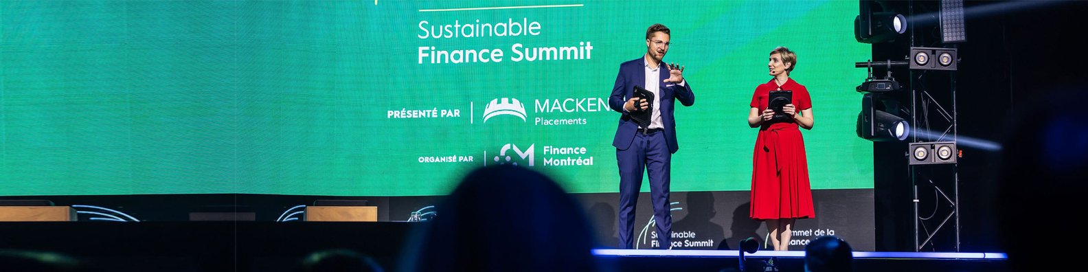 Nicholas Belliveau on stage with Sandrine Rastello at the Sustainable Finance Summit in Montreal