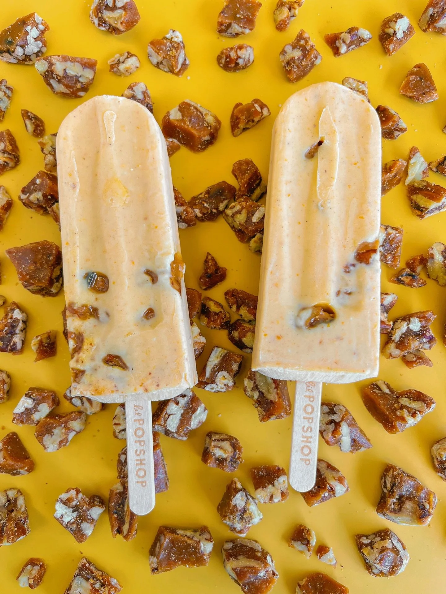 It&rsquo;s October and our PUMPKIN PECAN TOFFEE popsicle is ready for the season of pumpkin everything! This creamy pumpkin pop is sweetened with condensed milk, spiced with cinnamon, nutmeg, &amp; clove + chunks of homemade pecan toffee throughout ?