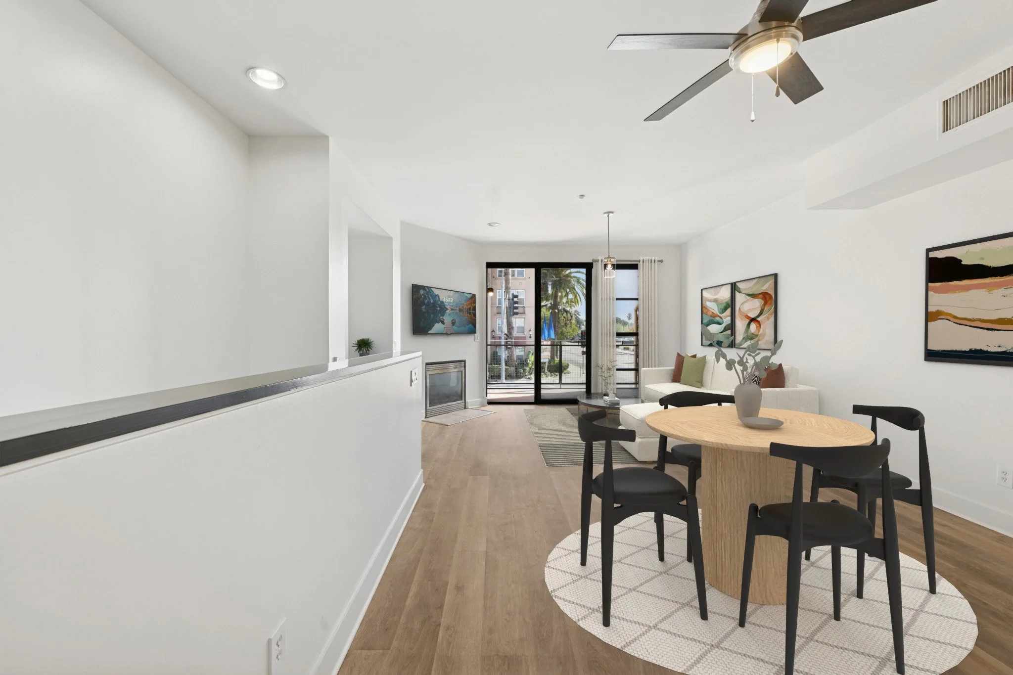 This is a photo of a two-bedroom apartment unit at M Sole. This image shows the dining & living room with great natural light. 