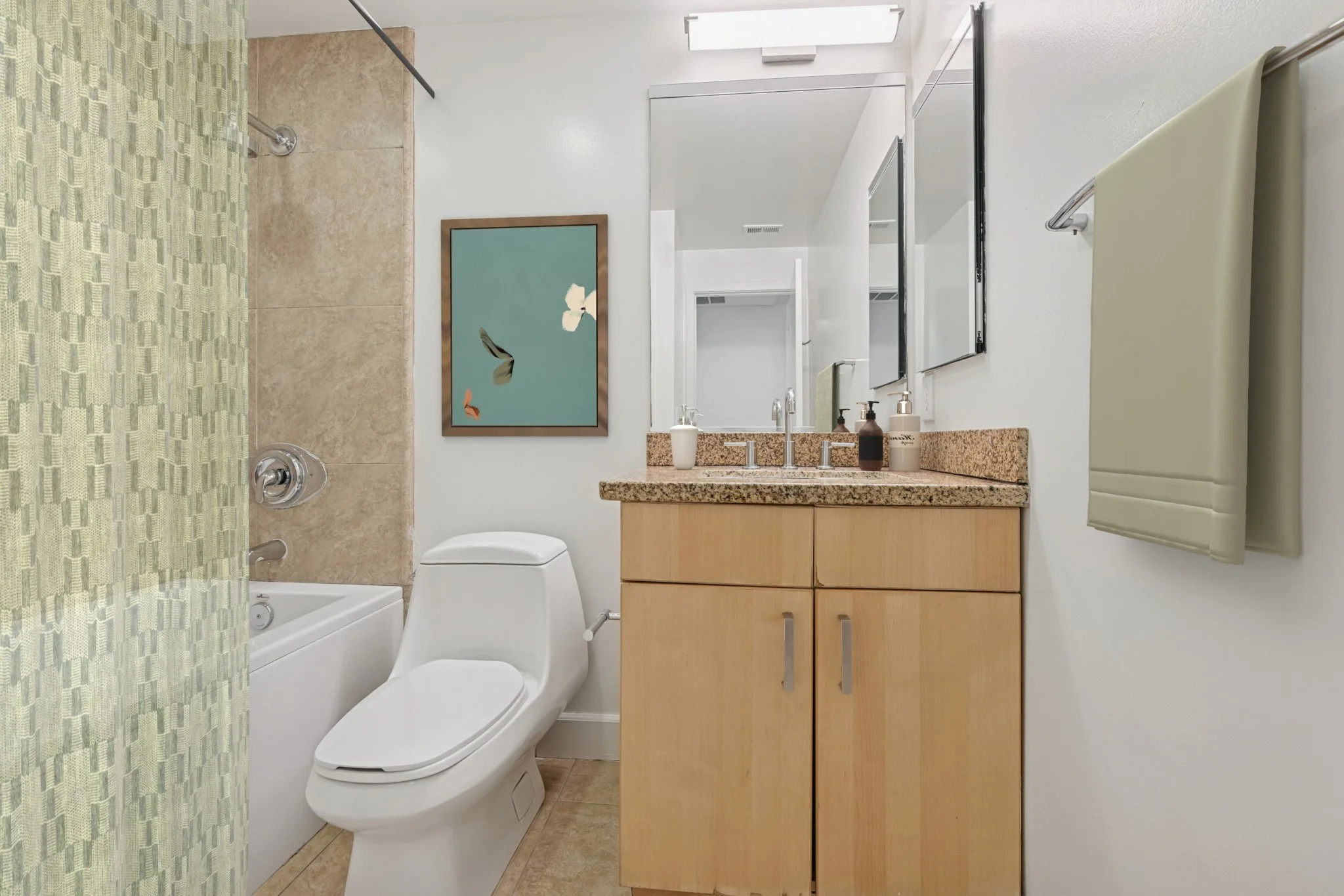 This is a photo of a two-bedroom apartment unit at M Sole. This image shows the bathroom for the 2nd bedroom. 