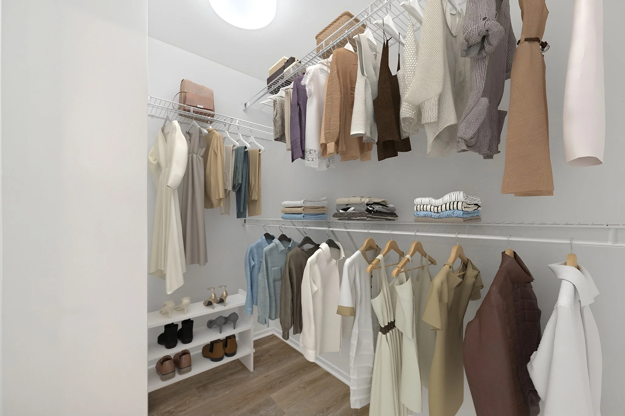 This is a photo of a two-bedroom apartment unit at M Sole. This image shows the spacious primary bedroom closet. 