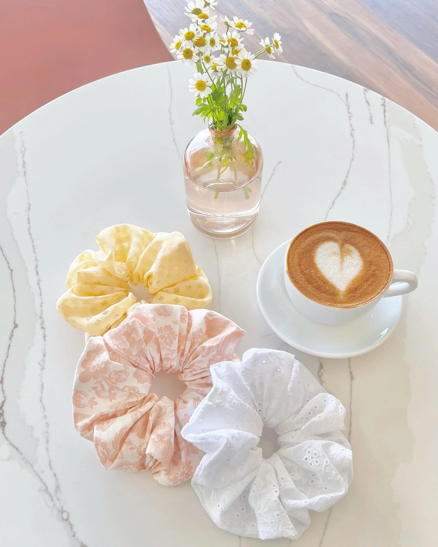 scrunchies for spring 🌸🌤🪴☕️ i&rsquo;ll be having a small launch next monday, march 21st at 6pm including these scrunchies and my new baby fresa merch (totes + stickers) save the reminder on this post so you don&rsquo;t miss it! ☺️💗