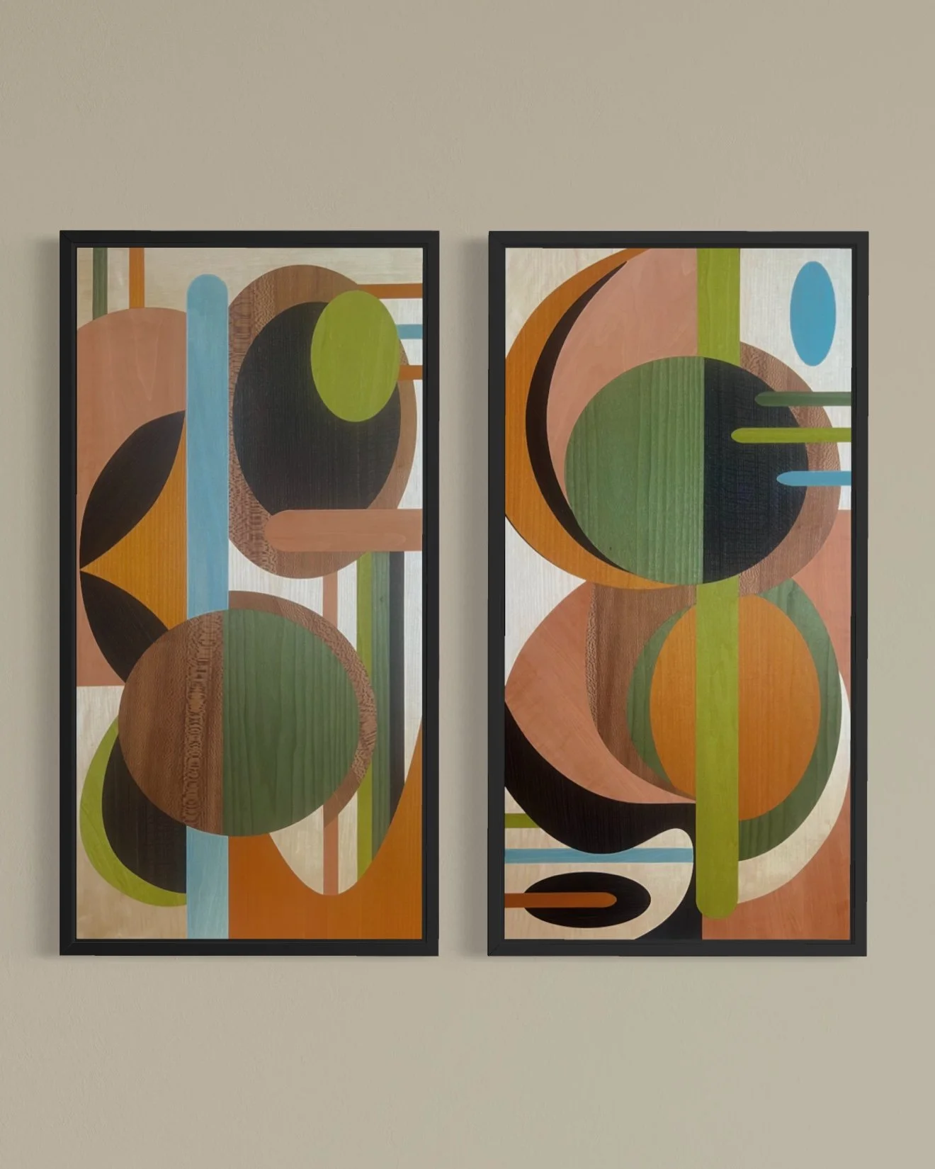 Two abstract geometric marquetry art pieces with circles, lines, and semi-circles in earth tones and green, framed and hung on a beige wall.