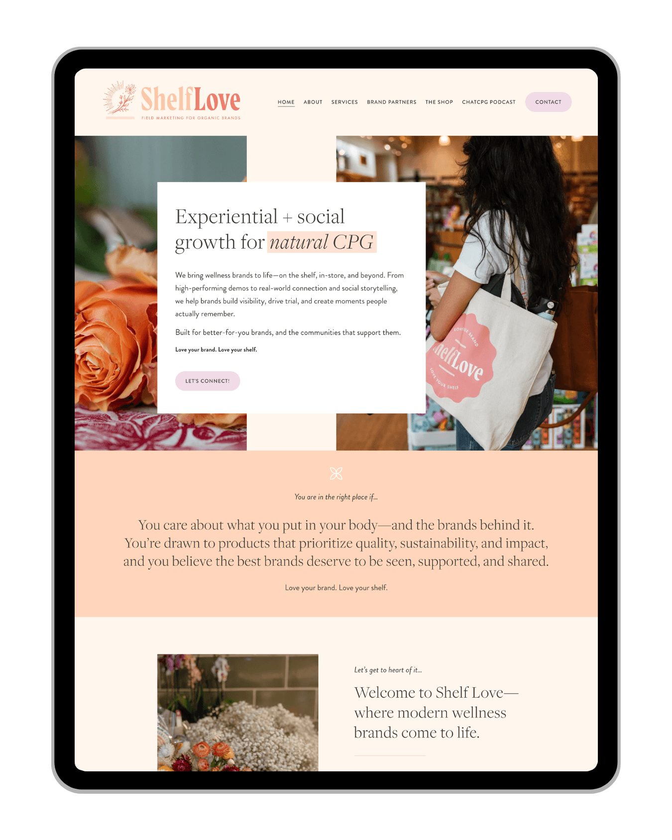 Screenshot of a website homepage for Shelf Love, a brand focused on wellness and organic products. The page features a woman with long dark hair carrying a tote bag with the Shelf Love logo inside a store with shelves of products. The website has sec