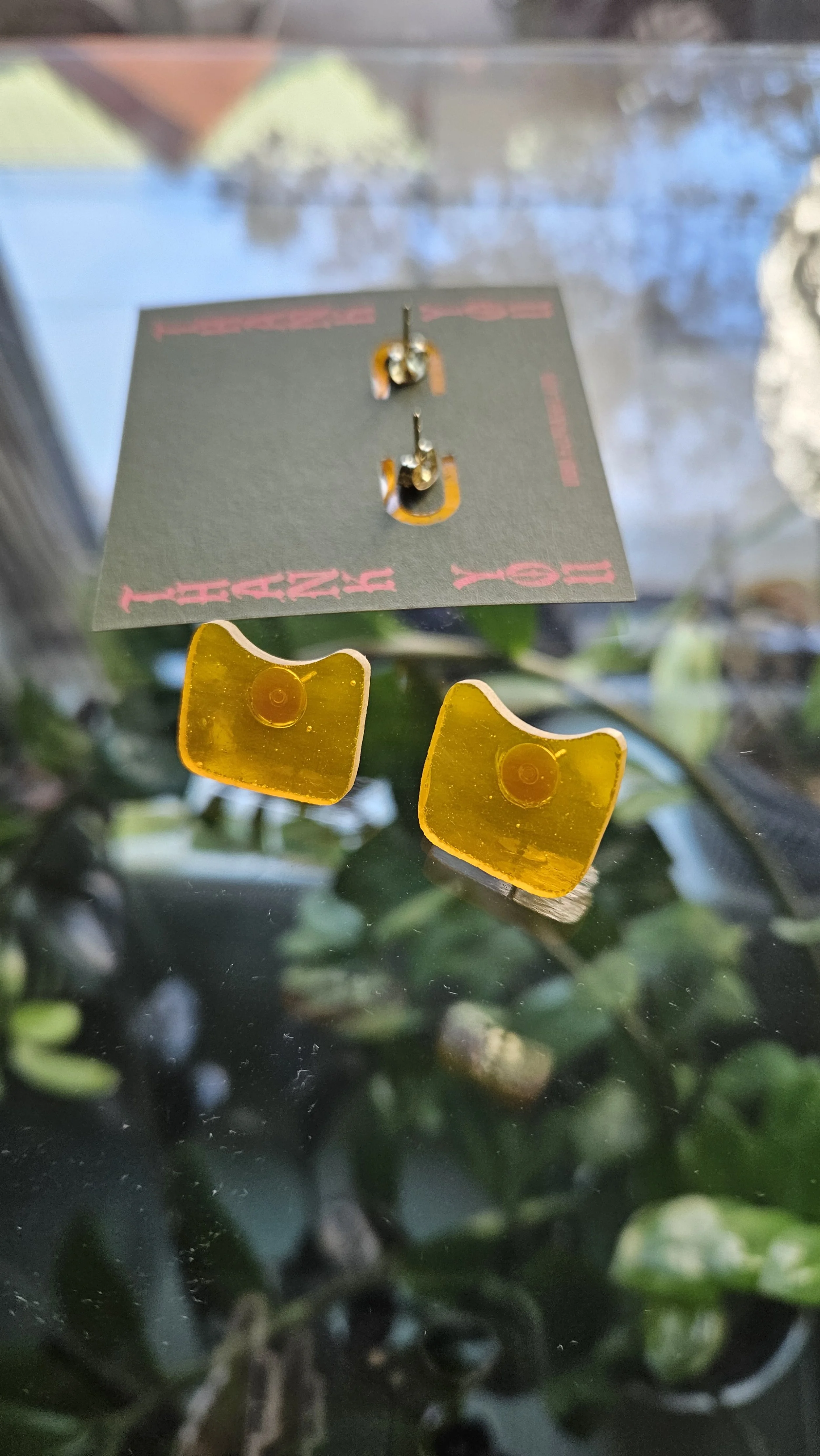 yellow tag glass studs