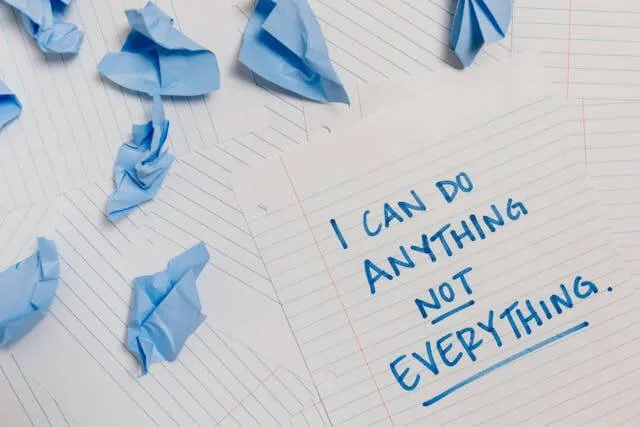 Paper with the message ‘I can do anything, not everything,’ symbolizing CBT boundary-setting and anxiety management at Wilson Counseling.