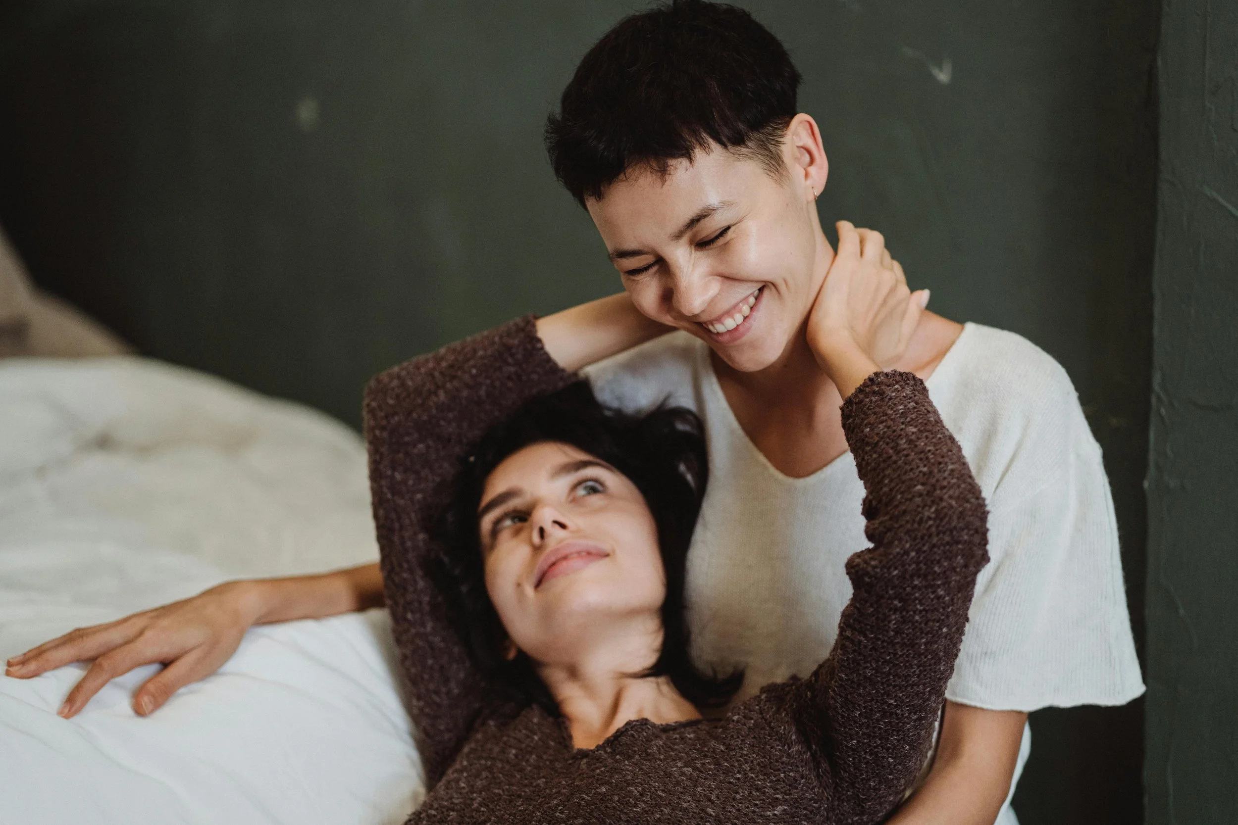 Same-sex couple sharing a close, intimate moment, showing how LGBTQ+ affair recovery counseling in Houston, TX can help rebuild trust, strengthen emotional connection, and heal after infidelity.