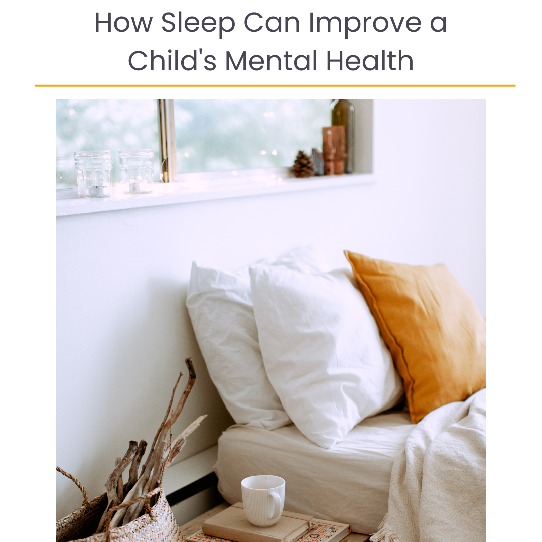 A cozy bedroom corner with white and mustard pillows on a bed, a cup on a small wooden table, and a window decorated with candles and bottles. Text over top reads, "How Sleep Can Improve a Child's Mental Health."